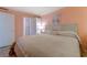 Serene main bedroom with ensuite bath featuring calming colors and ample space at 415 Ocean Creek Dr. # 2373, Myrtle Beach, SC 29572