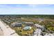 Aerial view of beachfront condos with a pool and boardwalk access at 417 S Dunes Dr., Pawleys Island, SC 29585