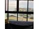 Bedroom view of the ocean with a white pedestrian bridge in the foreground at 417 S Dunes Dr., Pawleys Island, SC 29585