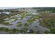 Panoramic aerial view of the marsh and tidal creeks showcasing the natural beauty at 417 S Dunes Dr., Pawleys Island, SC 29585