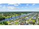 Stunning aerial view of homes along the waterway, showcasing the waterway and golf course views at 496 West Palm Dr., Myrtle Beach, SC 29579