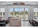 Open-concept living area with views of the lush backyard and inviting decor at 496 West Palm Dr., Myrtle Beach, SC 29579