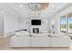 Bright living room with ample seating, fireplace, and access to the outdoors at 496 West Palm Dr., Myrtle Beach, SC 29579