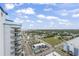 Expansive aerial view showcasing the city and community amenities under a bright, partly cloudy sky at 504 N Ocean Blvd. # 1901, Myrtle Beach, SC 29577