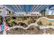 Overhead view showcasing meticulously kept landscaping, sun loungers and pools directly on the beach at 504 N Ocean Blvd. # 1901, Myrtle Beach, SC 29577