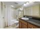 Bathroom featuring a vanity with granite countertop, toilet and shower-tub combination at 504 N Ocean Blvd. # 1901, Myrtle Beach, SC 29577