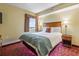 Bright bedroom with a queen bed, nightstands, lamps and a window with a view at 504 N Ocean Blvd. # 1901, Myrtle Beach, SC 29577