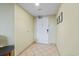 Hallway with a door and tile flooring that leads to the main living space at 504 N Ocean Blvd. # 1901, Myrtle Beach, SC 29577