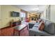 Inviting living room with a sectional sofa and TV that leads to the kitchen at 504 N Ocean Blvd. # 1901, Myrtle Beach, SC 29577