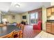 Open living space and dining area with natural light and access to a balcony at 504 N Ocean Blvd. # 1901, Myrtle Beach, SC 29577