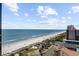 Stunning aerial view of the beach, cityscape, and beachfront property at 5511 N Ocean Blvd. # 1603, Myrtle Beach, SC 29577