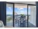 Balcony with chairs and a table overlooking a beautiful ocean view at 5511 N Ocean Blvd. # 1603, Myrtle Beach, SC 29577