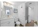 Bright bathroom featuring white fixtures, a vanity, and a shower/tub combo at 5511 N Ocean Blvd. # 1603, Myrtle Beach, SC 29577