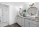 Bathroom featuring double sinks with granite countertops and vanity with drawers at 5511 N Ocean Blvd. # 1603, Myrtle Beach, SC 29577