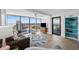 Living room with ocean views, neutral color palette, and a cozy sofa at 5511 N Ocean Blvd. # 1603, Myrtle Beach, SC 29577