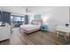 Bright main bedroom with view of the ocean, luxury vinyl floors, desk and balcony access at 5511 N Ocean Blvd. # 1603, Myrtle Beach, SC 29577