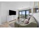 Relaxing living room with balcony access and ocean views at 5511 N Ocean Blvd. # 310, Myrtle Beach, SC 29577