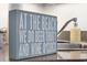 Close up of kitchen sink area with stainless steel sink, goose neck faucet, and humorous decorative sign at 5511 N Ocean Blvd. # 310, Myrtle Beach, SC 29577