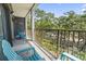View from a balcony with Adirondack chairs looking at a park at 5905 South Kings Hwy. # A337, Myrtle Beach, SC 29575