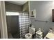 Bathroom featuring a tiled shower, toilet, and vanity with sink at 613 Todd Blvd., Conway, SC 29526