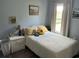 Cozy bedroom featuring neutral walls, a comfy bed, and bedside table with personal touches at 613 Todd Blvd., Conway, SC 29526