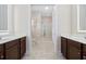 Bathroom featuring dual vanities, tile flooring, and glass-enclosed shower at 721 Mckinley Way, Myrtle Beach, SC 29577