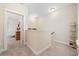Upstairs hallway features neutral carpet, a light color scheme, and access to rooms at 721 Mckinley Way, Myrtle Beach, SC 29577