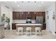 Modern kitchen with stainless steel appliances, a kitchen island, and barstool seating at 721 Mckinley Way, Myrtle Beach, SC 29577