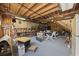 Spacious garage with wooden beams, offering ample space for projects and storage at 7288 Schooners Ct. Sw, Ocean Isle Beach, NC 28469