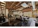 Spacious garage with wooden beams, offering ample space for projects and storage at 7288 Schooners Ct. Sw, Ocean Isle Beach, NC 28469