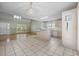 A bright kitchen, with hardwood floors, seamlessly connects to the living area, creating a comfortable and inviting space at 7288 Schooners Ct. Sw, Ocean Isle Beach, NC 28469