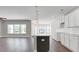 Spacious open kitchen with white cabinets, large island, and stainless steel sink at 872 Fowler Rd., Conway, SC 29526