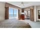 Comfortable bedroom featuring a dresser, a bed, and balcony access with stunning ocean views at 9994 Beach Club Dr. # 1202, Myrtle Beach, SC 29572