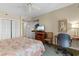 Comfortable bedroom with a kitchenette, a desk, and a closet, providing a functional living space at 9994 Beach Club Dr. # 1202, Myrtle Beach, SC 29572