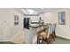 Kitchen featuring granite countertops, breakfast bar, and modern appliances at 9994 Beach Club Dr. # 1202, Myrtle Beach, SC 29572