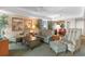 Inviting living room with plush seating, a coffee table, and views of the dining area at 9994 Beach Club Dr. # 1202, Myrtle Beach, SC 29572