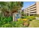 Lush landscaping and signage welcomes you to Royale Palms at 9994 Beach Club Dr. # 1202, Myrtle Beach, SC 29572