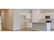 Eat-in kitchen features stainless steel appliances, white cabinets, and an island at Lot 147 Tibetan St., Conway, SC 29526