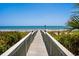 Private boardwalk leading to the beach provides easy access to the sand and surf at 100 Ocean Park Loop, Georgetown, SC 29440