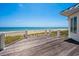 Seaside deck with weathered wood and views of the beautiful beach and ocean at 100 Ocean Park Loop, Georgetown, SC 29440