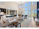 Spacious living room with high ceilings, ocean views, lots of natural light and open to the dining area at 100 Ocean Park Loop, Georgetown, SC 29440