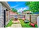 Cozy backyard with a grill, fire pit, and outdoor seating, perfect for entertaining and relaxation at 10056 Kings Rd., Myrtle Beach, SC 29572