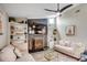 Well-lit living room with a stylish fireplace, built-in shelving, and comfortable seating, creating a welcoming atmosphere at 10056 Kings Rd., Myrtle Beach, SC 29572