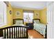 Well-lit bedroom with two full beds and lots of space at 101 W First St. # A2, Ocean Isle Beach, NC 28469