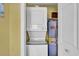 Stacked washer and dryer appliances conveniently tucked away in closet space at 101 W First St. # A2, Ocean Isle Beach, NC 28469