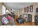 Comfortable living room with plush sofas and decor, creating an inviting space to relax at 101 W First St. # A2, Ocean Isle Beach, NC 28469