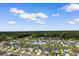 Aerial view of the property in a serene neighborhood setting at 1029 Saltgrass Way, Myrtle Beach, SC 29588