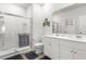 Modern bathroom featuring double sinks and a walk-in shower at 1029 Saltgrass Way, Myrtle Beach, SC 29588