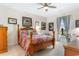 Cozy bedroom featuring a four-poster bed and stylish decor at 1029 Saltgrass Way, Myrtle Beach, SC 29588