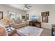Bright living room with comfortable seating and a large screen television at 1029 Saltgrass Way, Myrtle Beach, SC 29588
